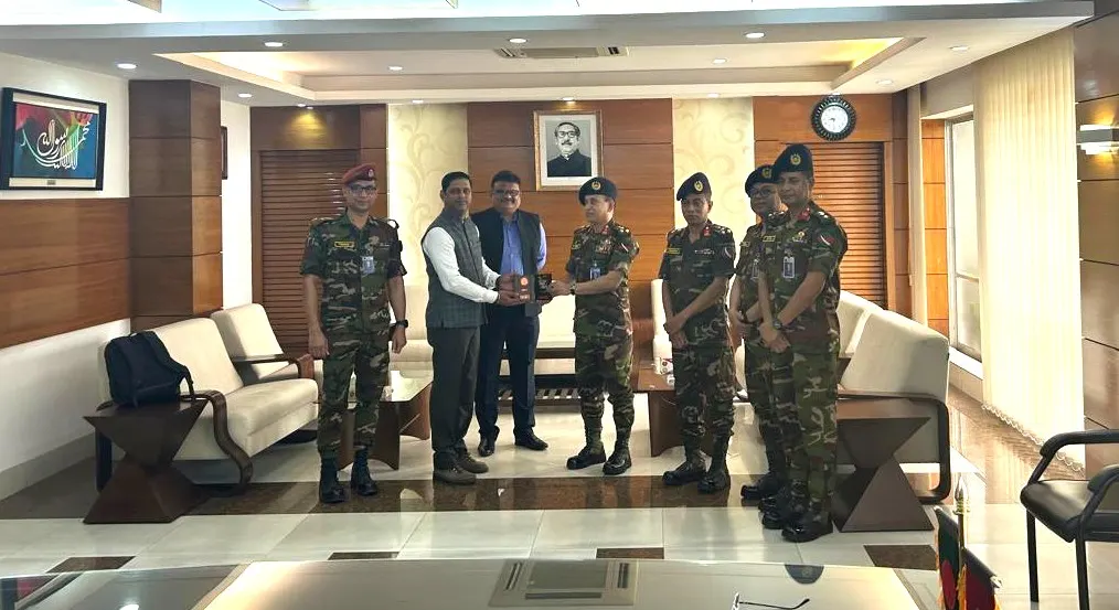 A memento being presented to senior officers of the Bangladesh Army during an official visit